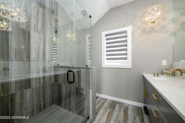 Bathroom, Chandelier, Glass Shower, Interior, Wood Texture Flooring
