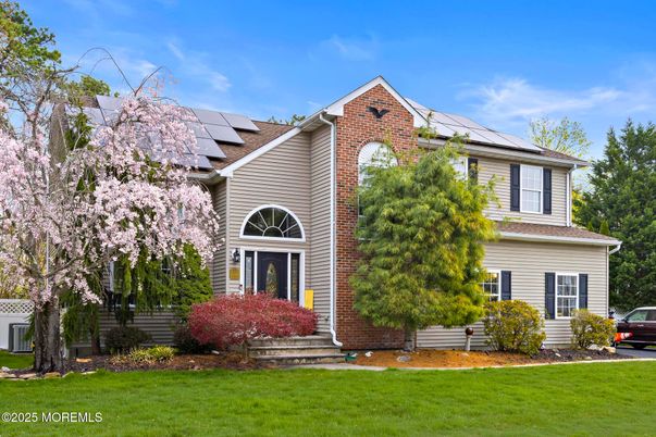 Exterior, Facade, Brick Facade, Solar Panels, Tudor Revival