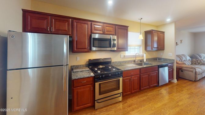 Interior, Kitchen, Pendant Lights, Recessed Lighting, Stainless Steel Appliances, Wood Texture Flooring