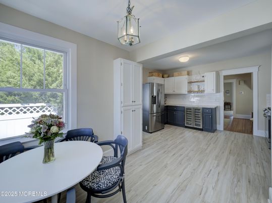 Dining room, Interior, Kitchen, Pendant Lights, Stainless Steel Appliances, Wood Texture Flooring