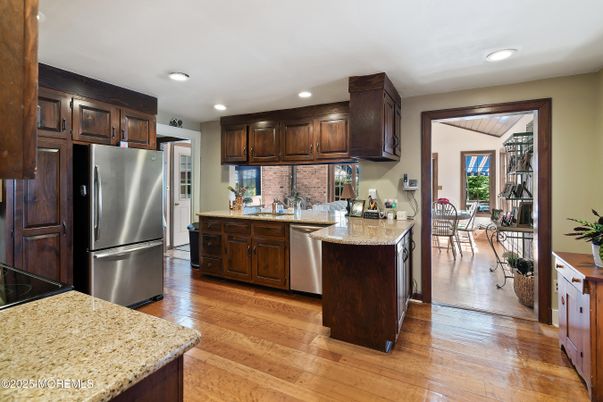 Dining room, Interior, Kitchen, Recessed Lighting, Stainless Steel Appliances, Wood Texture Flooring