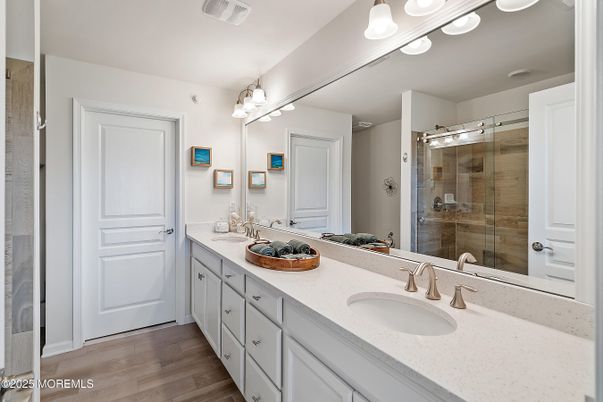Bathroom, Dual Sink Vanities, Glass Shower, Interior, Wood Texture Flooring