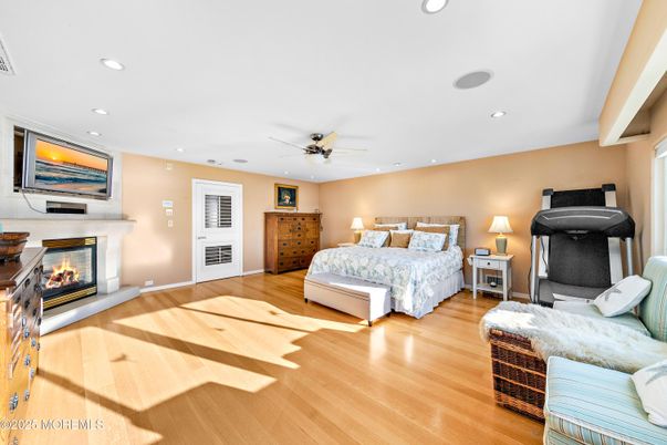 Bedroom, Fireplace, Interior, Recessed Lighting, Wood Texture Flooring