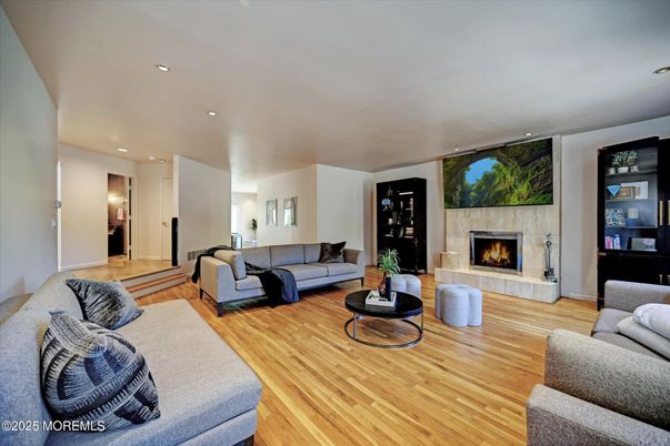 Fireplace, Interior, Living room, Recessed Lighting, Wood Texture Flooring