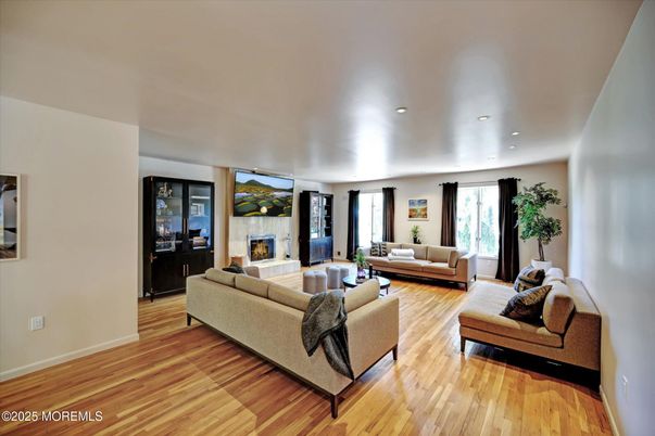 Fireplace, Interior, Living room, Recessed Lighting, Wood Texture Flooring