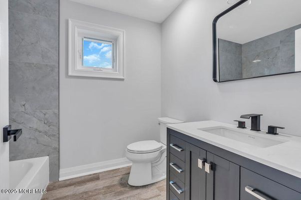Bathroom, Interior, Marble Walls, Recessed Lighting, Wood Texture Flooring