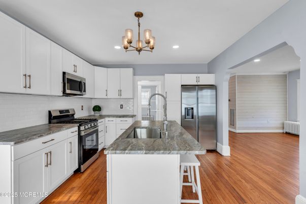 Chandelier, Interior, Kitchen, Recessed Lighting, Stainless Steel Appliances, Wood Texture Flooring