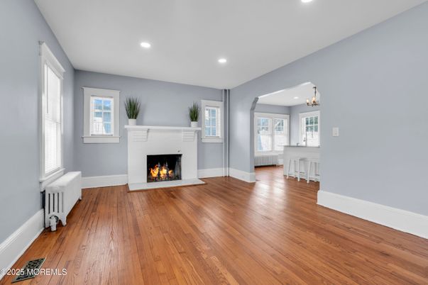 Empty room, Fireplace, Interior, Recessed Lighting, Wood Texture Flooring