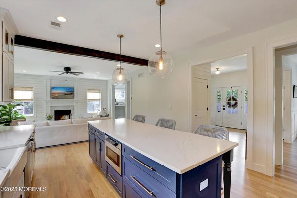 Fireplace, Interior, Kitchen, Living room, Pendant Lights, Recessed Lighting, Wood Texture Flooring