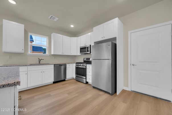 Interior, Kitchen, Recessed Lighting, Stainless Steel Appliances, Wood Texture Flooring