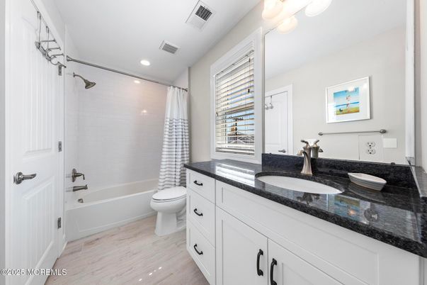 Bathroom, Dual Sink Vanities, Interior, Recessed Lighting, Wood Texture Flooring