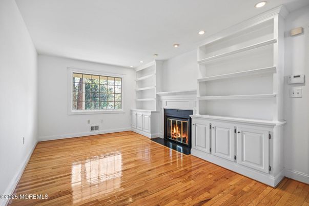 Empty room, Fireplace, Interior, Recessed Lighting, Wood Texture Flooring