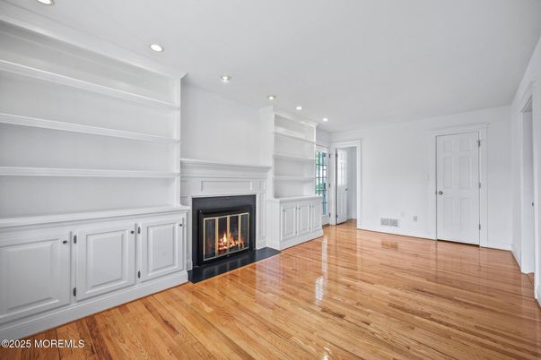 Empty room, Fireplace, Interior, Recessed Lighting, Wood Texture Flooring