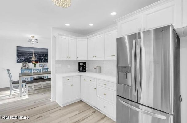 Dining room, Interior, Kitchen, Recessed Lighting, Stainless Steel Appliances, Wood Texture Flooring