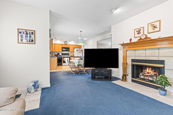 Dining room, Fireplace, Interior, Kitchen, Pendant Lights, Stainless Steel Appliances