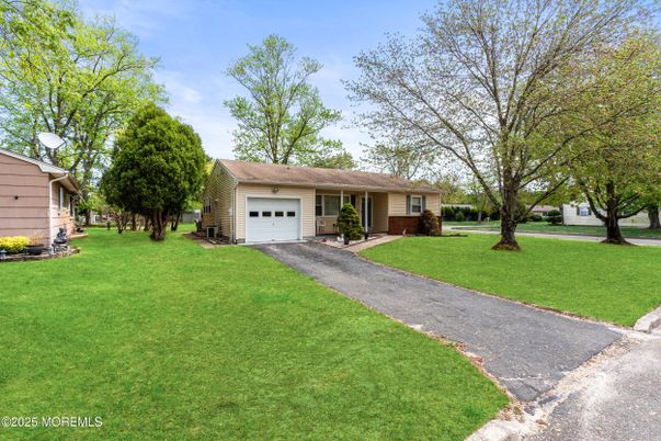 Attached, Backyard, Exterior, Facade, Brick Facade, Ranch