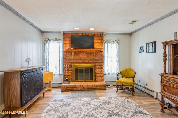 Fireplace, Interior, Recessed Lighting, Wood Texture Flooring
