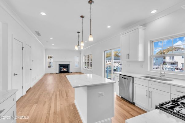 Fireplace, Interior, Kitchen, Pendant Lights, Recessed Lighting, Wood Texture Flooring