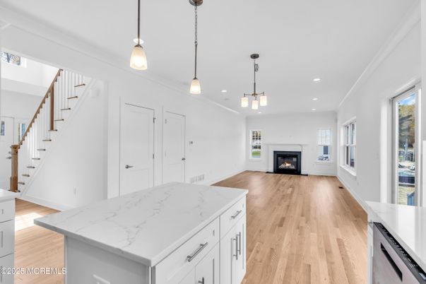 Empty room, Fireplace, Interior, Pendant Lights, Recessed Lighting, Wood Texture Flooring