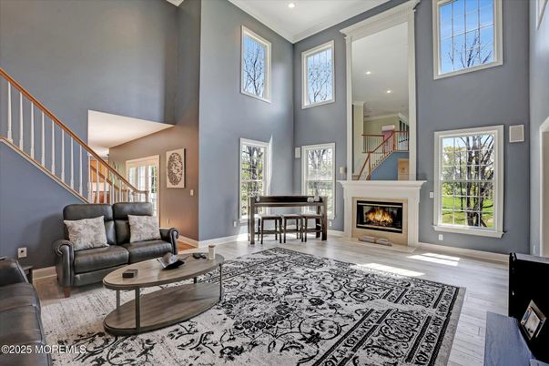 Fireplace, Interior, Living room, Piano, Recessed Lighting, Wood Texture Flooring