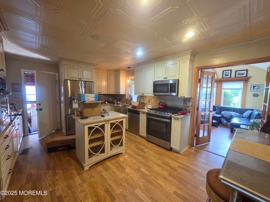 Interior, Kitchen, Living room, Pendant Lights, Recessed Lighting, Stainless Steel Appliances, Wood Texture Flooring