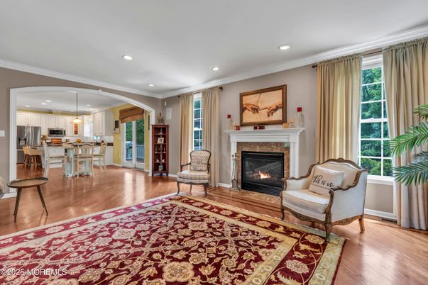 Dining room, Fireplace, Interior, Kitchen, Pendant Lights, Recessed Lighting, Stainless Steel Appliances, Wood Texture Flooring
