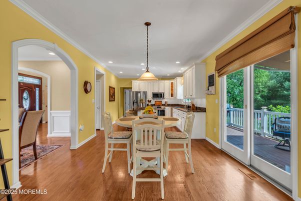 Dining room, Interior, Kitchen, Pendant Lights, Recessed Lighting, Stainless Steel Appliances, Wood Texture Flooring