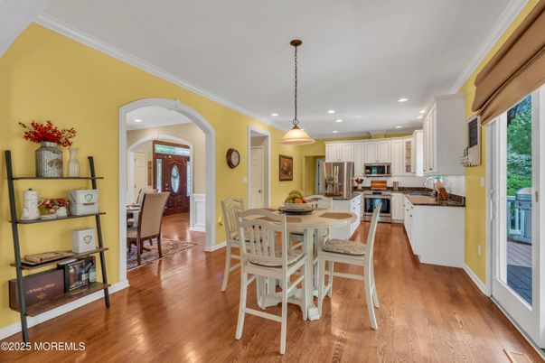 Dining room, Interior, Kitchen, Pendant Lights, Recessed Lighting, Stainless Steel Appliances, Wood Texture Flooring