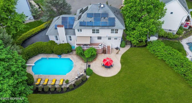 Exterior, Pool, Solar Panels