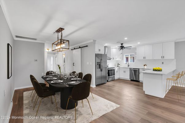 Dining room, Interior, Kitchen, Pendant Lights, Recessed Lighting, Stainless Steel Appliances, Wood Texture Flooring