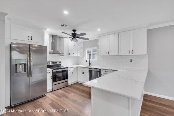 Interior, Kitchen, Recessed Lighting, Stainless Steel Appliances, Wood Texture Flooring