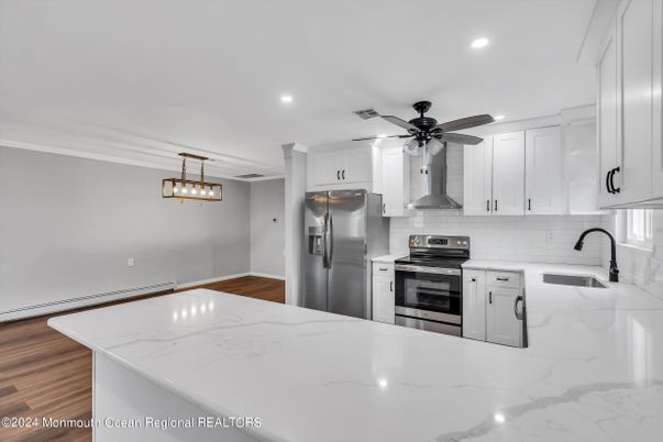 Interior, Kitchen, Pendant Lights, Recessed Lighting, Stainless Steel Appliances, Wood Texture Flooring