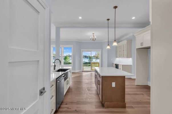 Chandelier, Interior, Kitchen, Pendant Lights, Recessed Lighting, Stainless Steel Appliances, Wood Texture Flooring