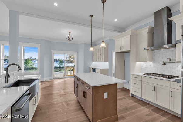 Chandelier, Interior, Kitchen, Pendant Lights, Recessed Lighting, Stainless Steel Appliances, Wood Texture Flooring