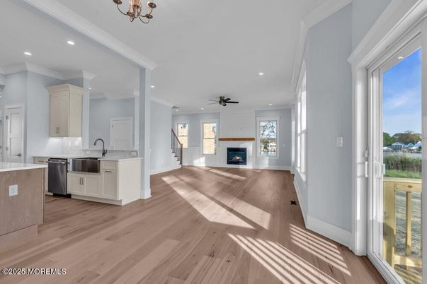 Fireplace, Interior, Kitchen, Recessed Lighting, Wood Texture Flooring