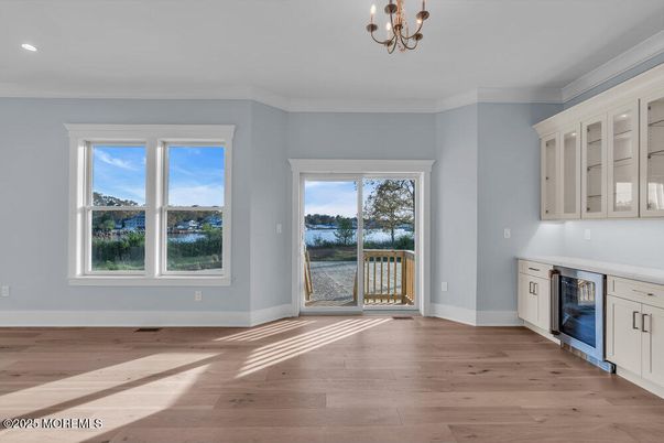 Chandelier, Empty room, Fireplace, Interior, Recessed Lighting, Wood Texture Flooring