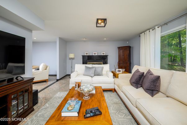Fireplace, Interior, Living room, Piano, Recessed Lighting, Wood Texture Flooring