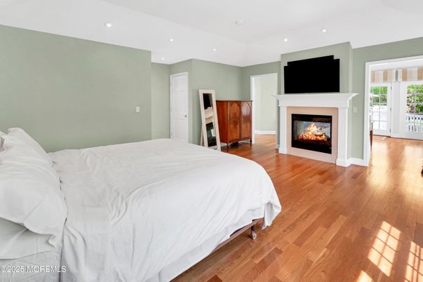 Bedroom, Fireplace, Interior, Recessed Lighting, Wood Texture Flooring