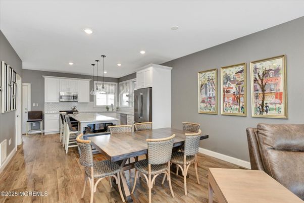 Dining room, Interior, Kitchen, Pendant Lights, Recessed Lighting, Stainless Steel Appliances, Wood Texture Flooring