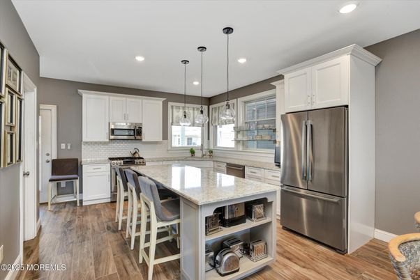 Interior, Kitchen, Pendant Lights, Recessed Lighting, Stainless Steel Appliances, Wood Texture Flooring
