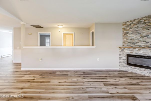 Empty room, Fireplace, Interior, Stone Walls, Wood Texture Flooring