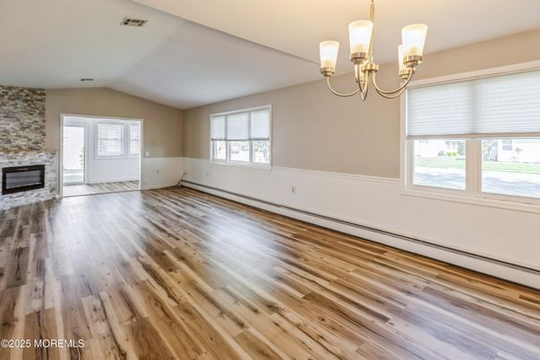 Chandelier, Empty room, Fireplace, Interior, Wood Texture Flooring
