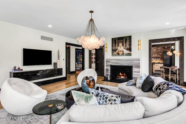 Dining room, Fireplace, Interior, Living room, Pendant Lights, Recessed Lighting, Wood Texture Flooring