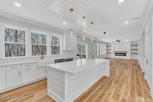 Fireplace, Interior, Kitchen, Pendant Lights, Recessed Lighting, Wood Texture Flooring