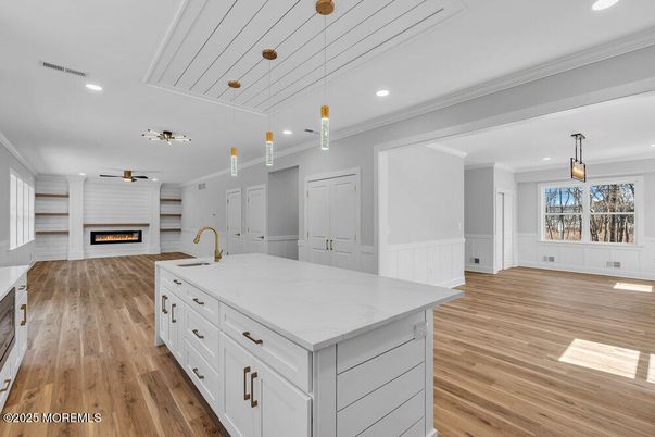 Fireplace, Interior, Kitchen, Pendant Lights, Recessed Lighting, Wood Texture Flooring
