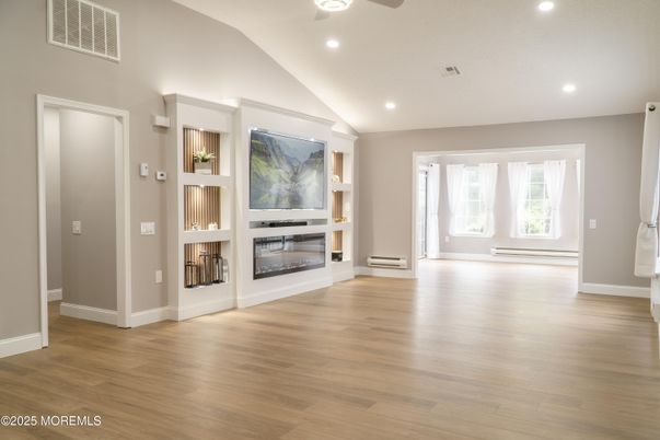 Empty room, Fireplace, Interior, Recessed Lighting, Wood Texture Flooring