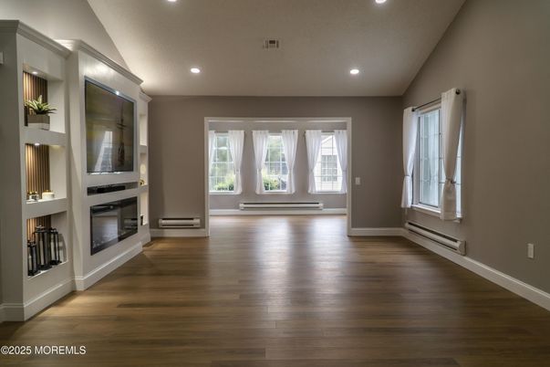 Empty room, Fireplace, Interior, Recessed Lighting, Wood Texture Flooring