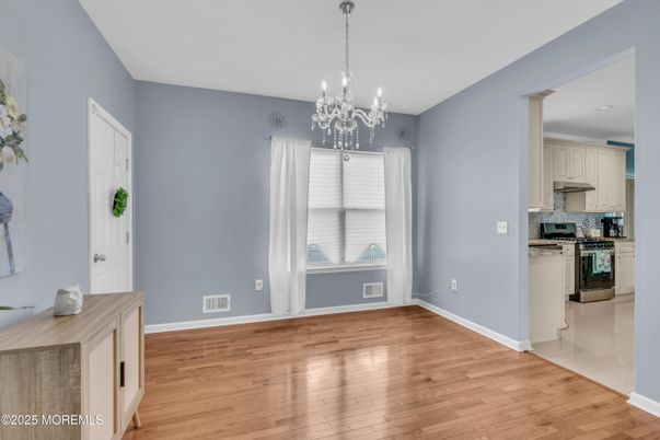 Chandelier, Empty room, Interior, Kitchen, Stainless Steel Appliances, Wood Texture Flooring