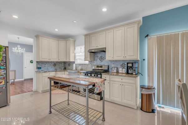 Chandelier, Interior, Kitchen, Recessed Lighting, Stainless Steel Appliances, Wood Texture Flooring