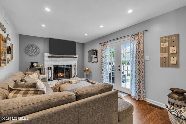 Fireplace, Interior, Living room, Recessed Lighting, Wood Texture Flooring